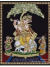 Krishna playing under tree